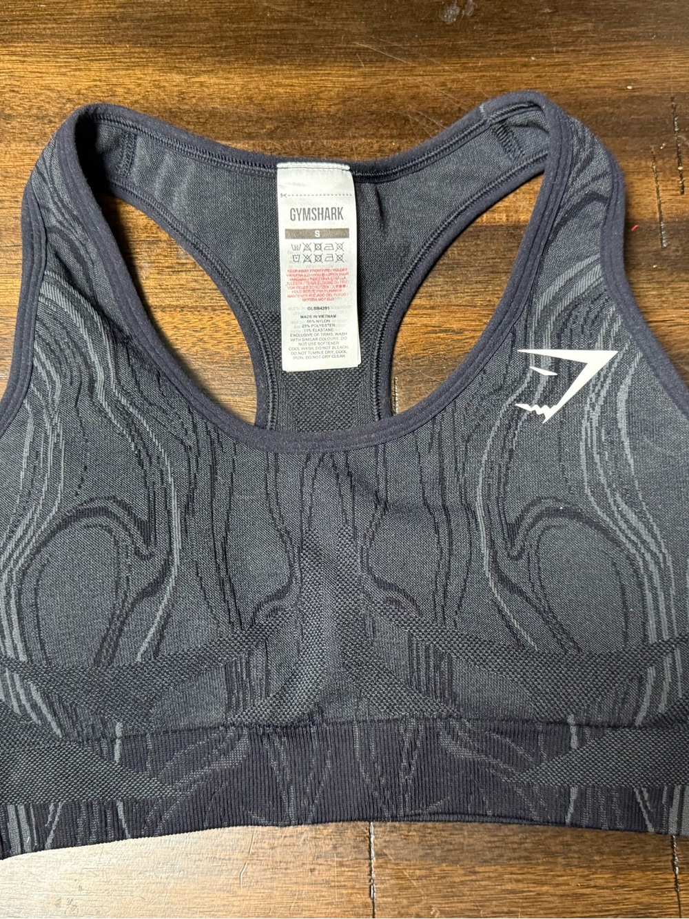 Gymshark Black Seamless Racerback Sports Bra with Subtle Pattern